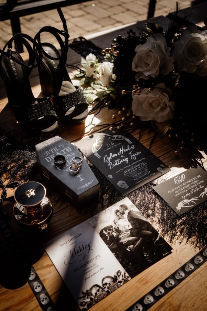 Gothic wedding details with shoes, invitations, rings and more