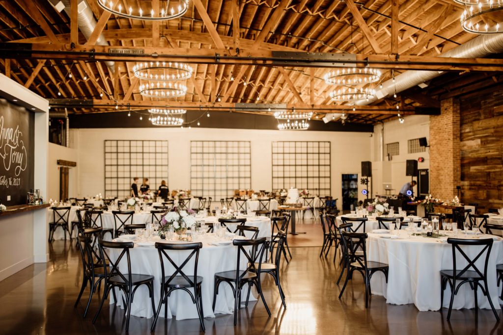 Reception photos of The Bridge Lemont that showcase the tables and wooden ceilings
