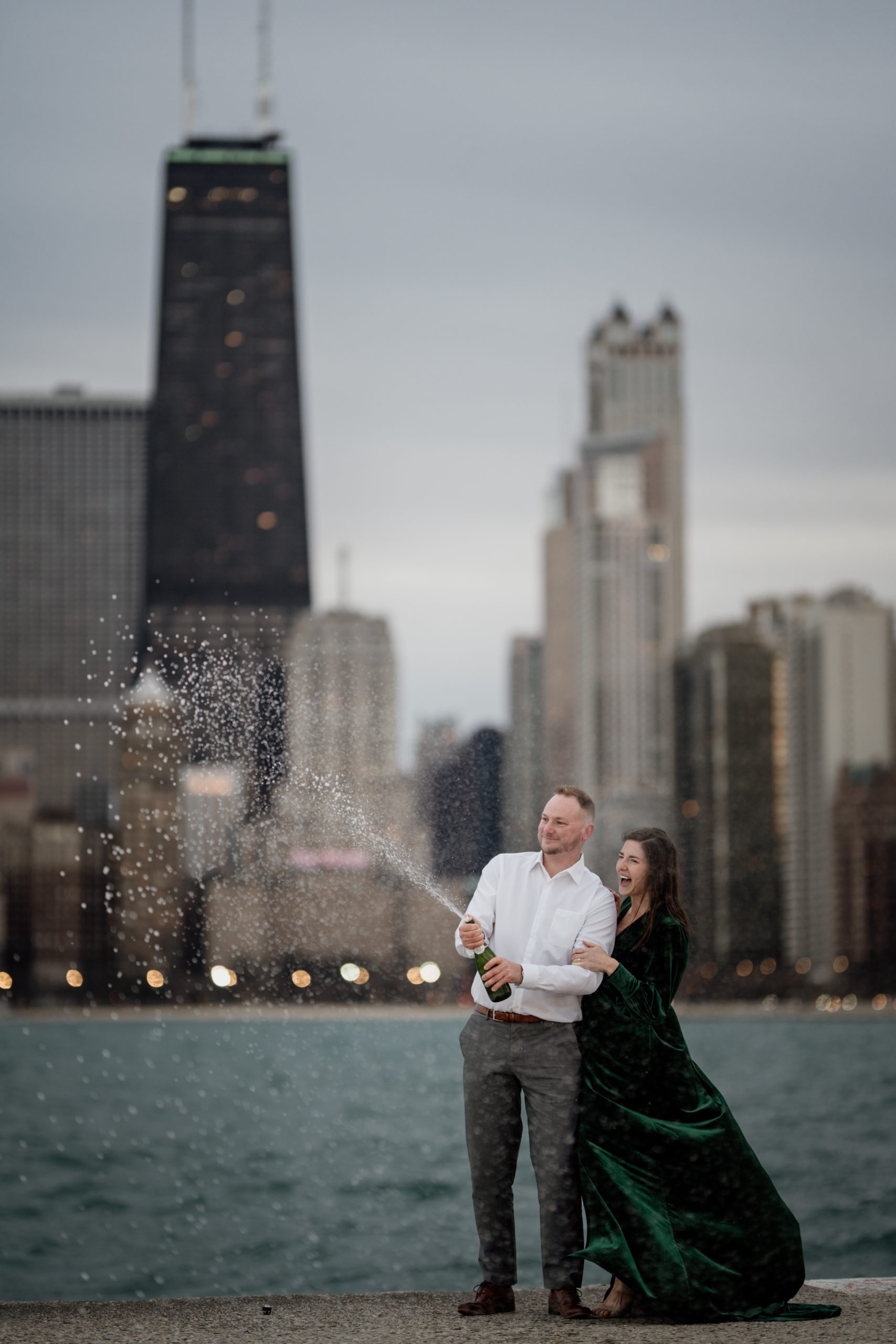 chicago engagement photos champagne spray